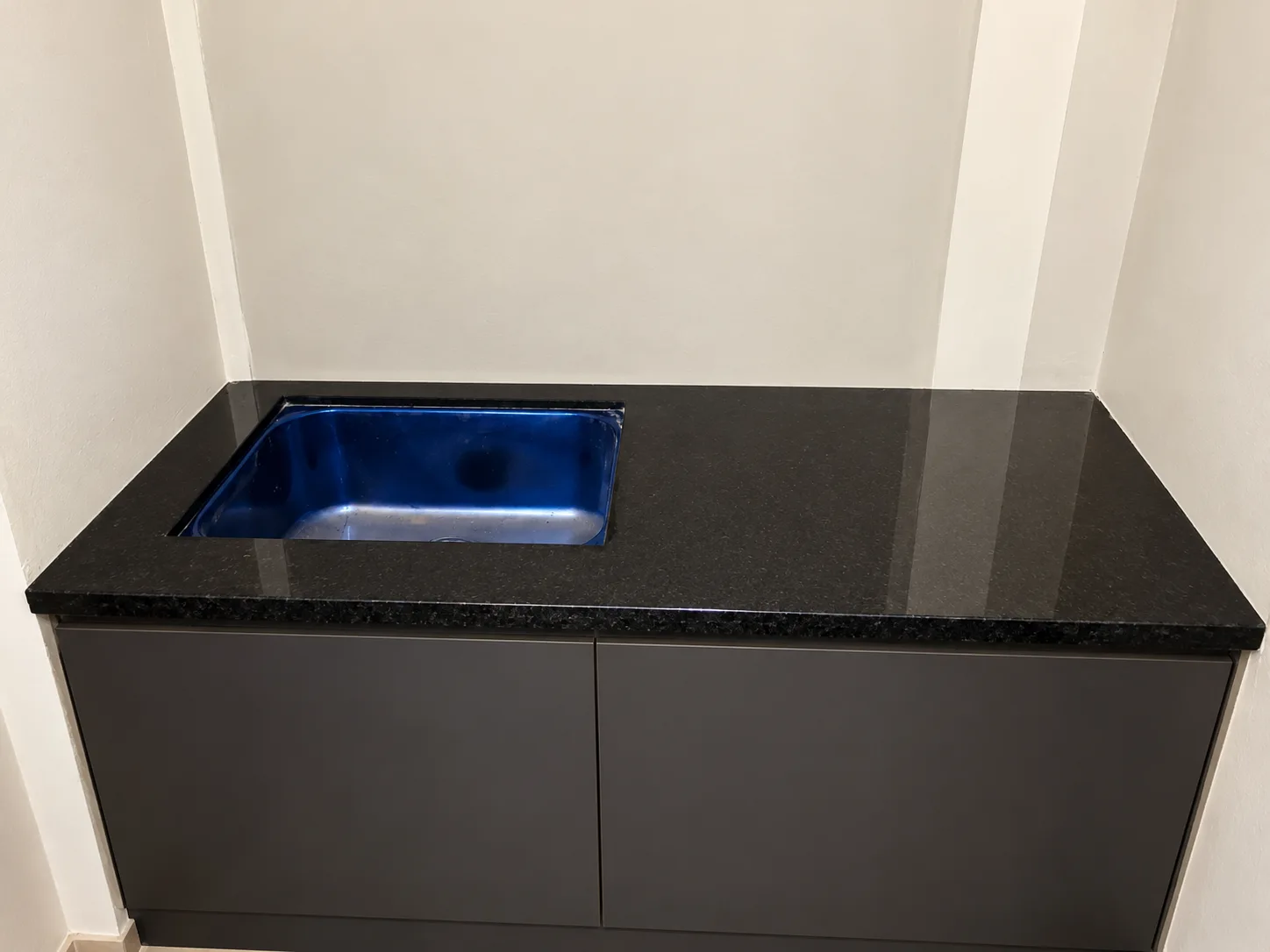 Minimalist Charcoal Stone Sink Alcove